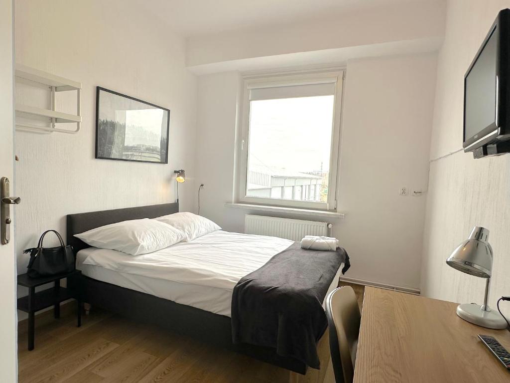 Posteľ alebo postele v izbe v ubytovaní Premium Hostel & Bistro - HostelPremium pl