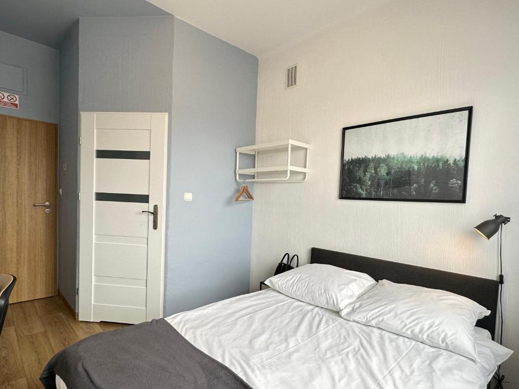 Posteľ alebo postele v izbe v ubytovaní Premium Hostel & Bistro - HostelPremium pl