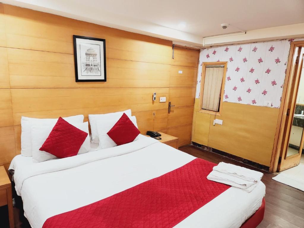 Postel nebo postele na pokoji v ubytování Hotels Daffodils