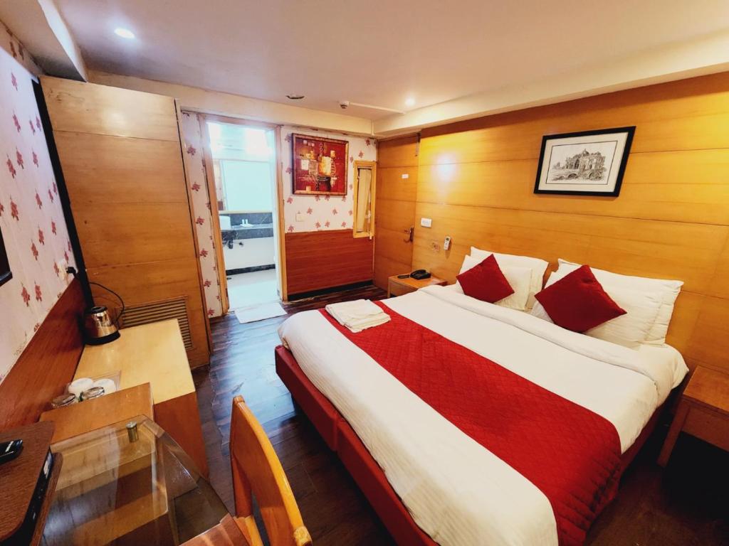 Postel nebo postele na pokoji v ubytování Hotels Daffodils