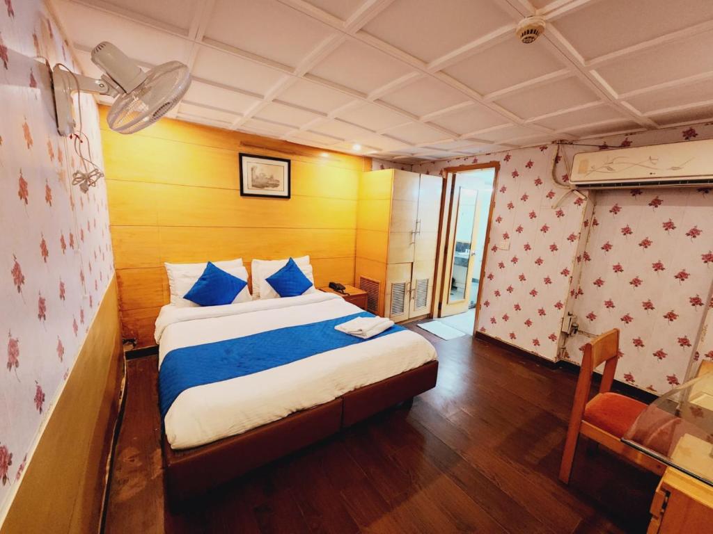 Postel nebo postele na pokoji v ubytování Hotels Daffodils