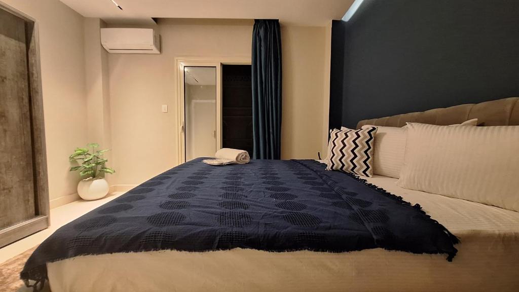 Postel nebo postele na pokoji v ubytování downtown Family Suites