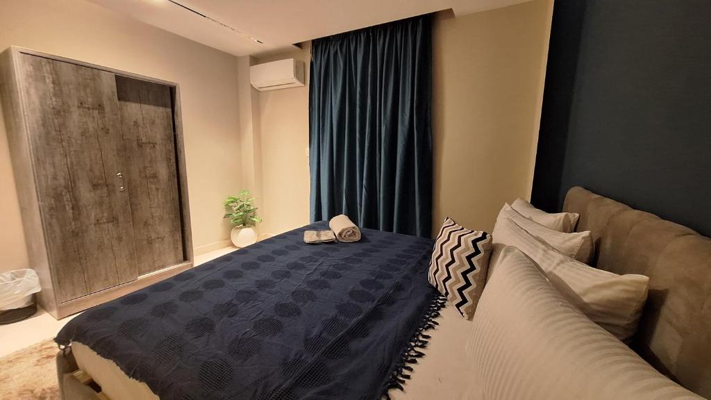 Postel nebo postele na pokoji v ubytování downtown Family Suites
