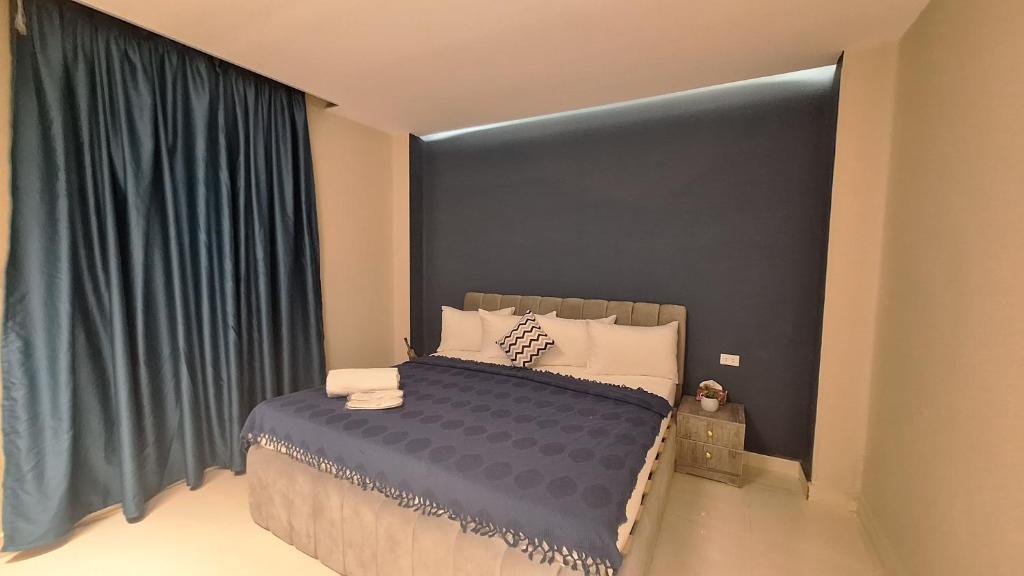 Postel nebo postele na pokoji v ubytování downtown Family Suites