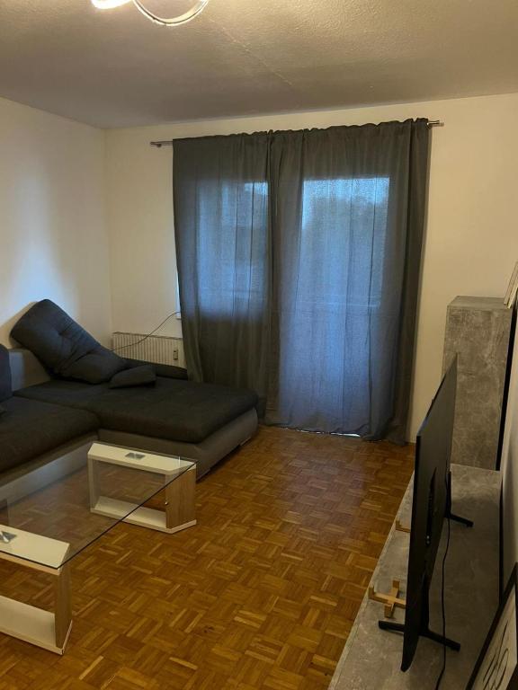 Posezení v ubytování Gemütliche Wohnung in Leonding