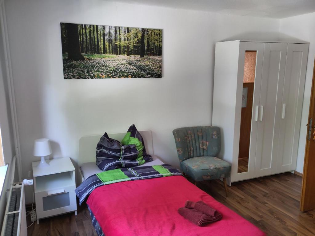 Postel nebo postele na pokoji v ubytování Gästehaus LieNa in der Winkelsmühle