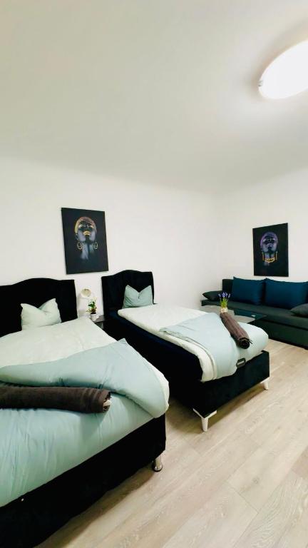 Postel nebo postele na pokoji v ubytování Spacious 2BR & 1LR Apt for 7P Peaceful Location