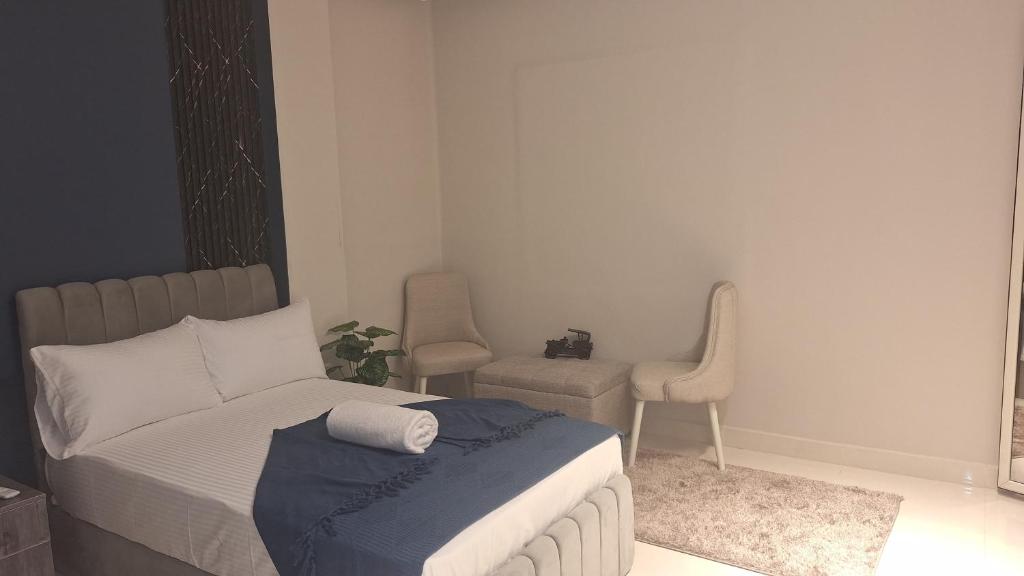 Postel nebo postele na pokoji v ubytování Cairo Downtown Apartments