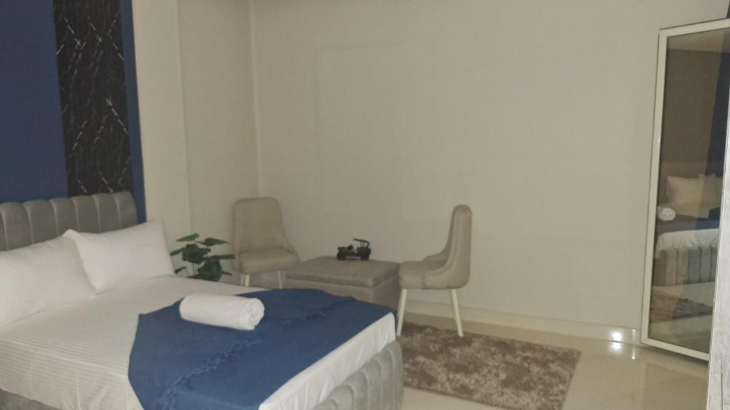 Postel nebo postele na pokoji v ubytování Cairo Downtown Apartments