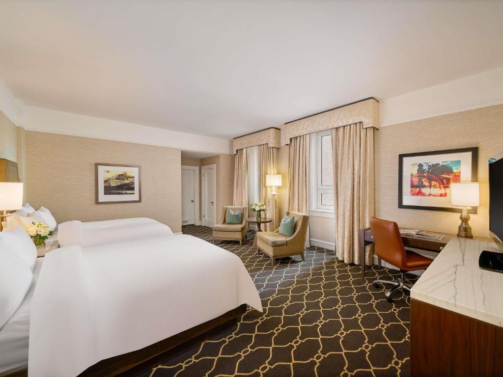 Postel nebo postele na pokoji v ubytování Fairmont Palliser
