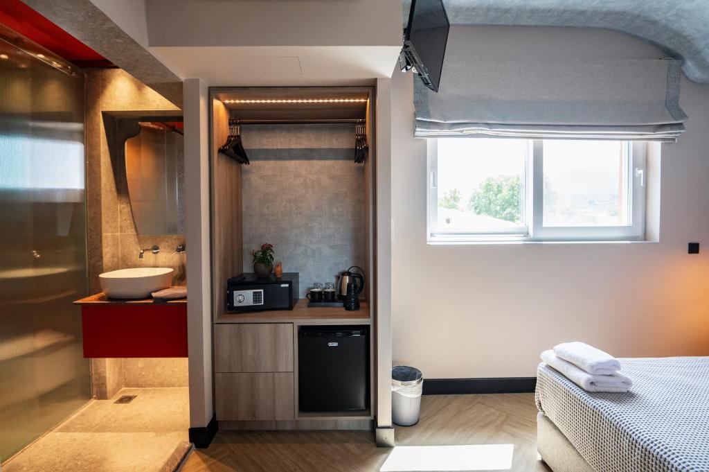 Kuchyň nebo kuchyňský kout v ubytování Hotel Coral