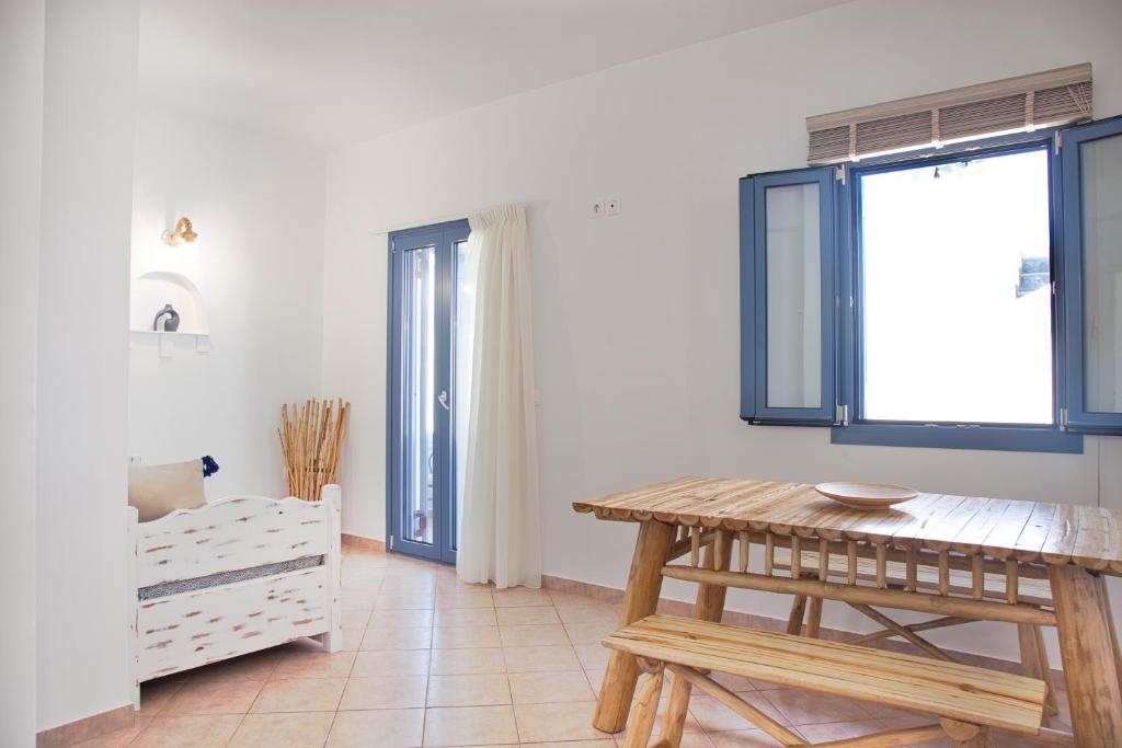 Postel nebo postele na pokoji v ubytování Aquarius Village Agistri