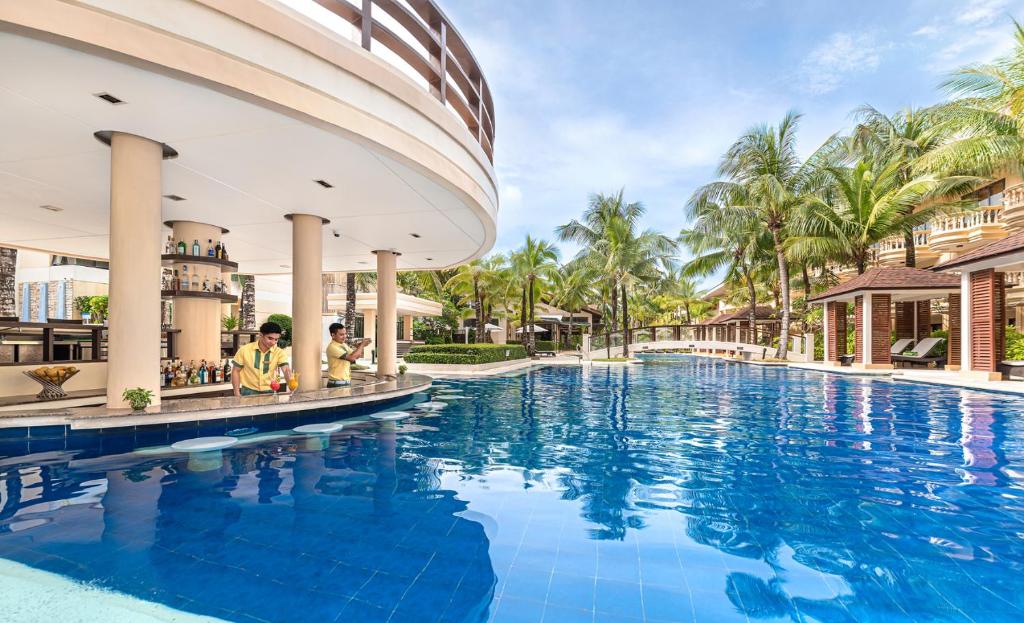 Bazén v ubytování Henann Garden Resort nebo v jeho okolí
