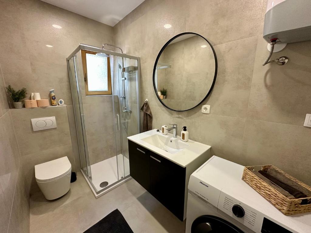 Koupelna v ubytování APARTMANI KIKI