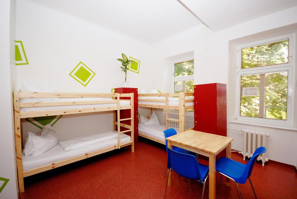 A bed or beds in a room at Westend City Hostel