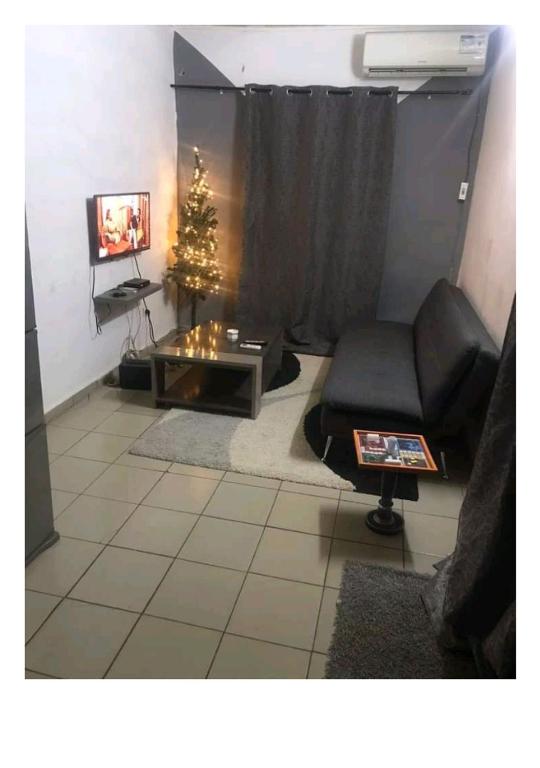 Istumisnurk majutusasutuses Studio Ydé-Nlongkak
