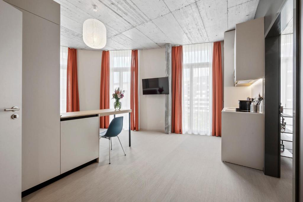 Μια τηλεόραση ή/και κέντρο ψυχαγωγίας στο Ariv Design Hotel Zug