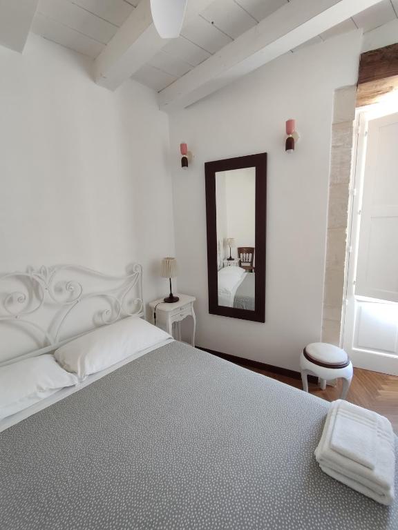 Postel nebo postele na pokoji v ubytování La Via della Giudecca