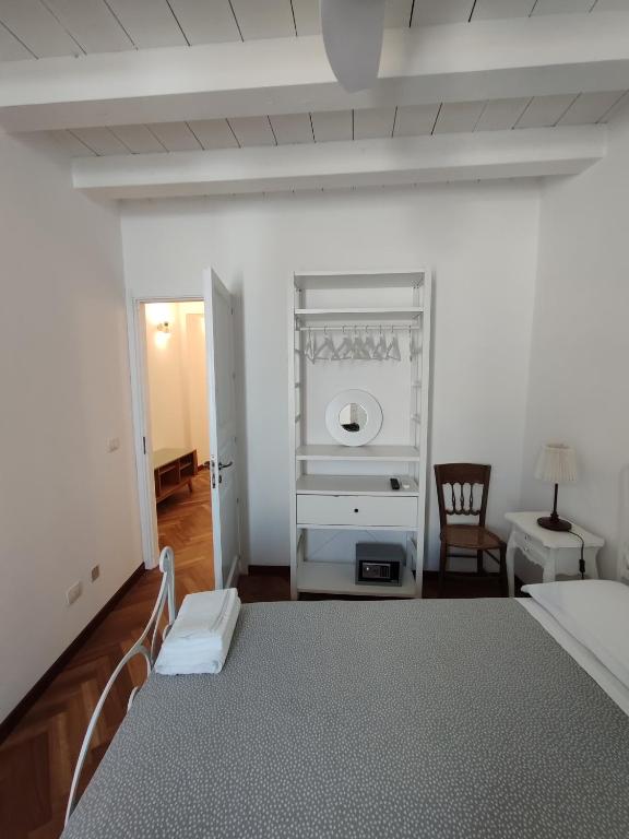 Postel nebo postele na pokoji v ubytování La Via della Giudecca