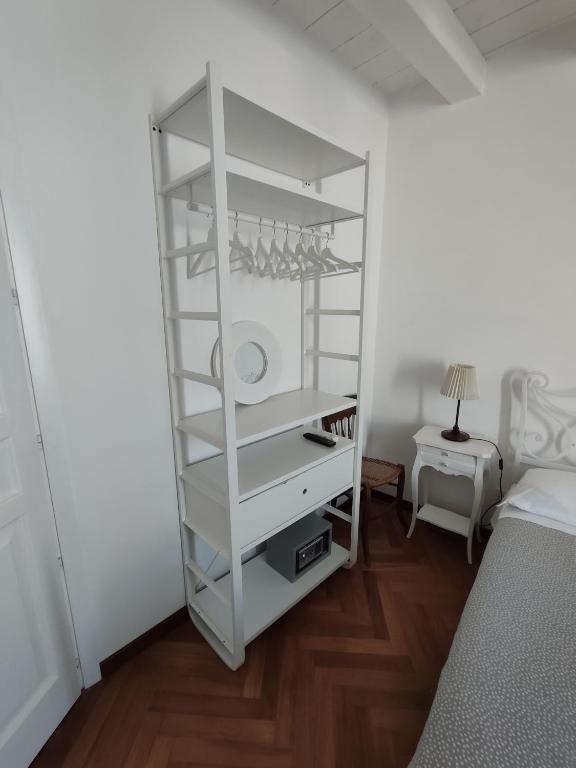 Postel nebo postele na pokoji v ubytování La Via della Giudecca