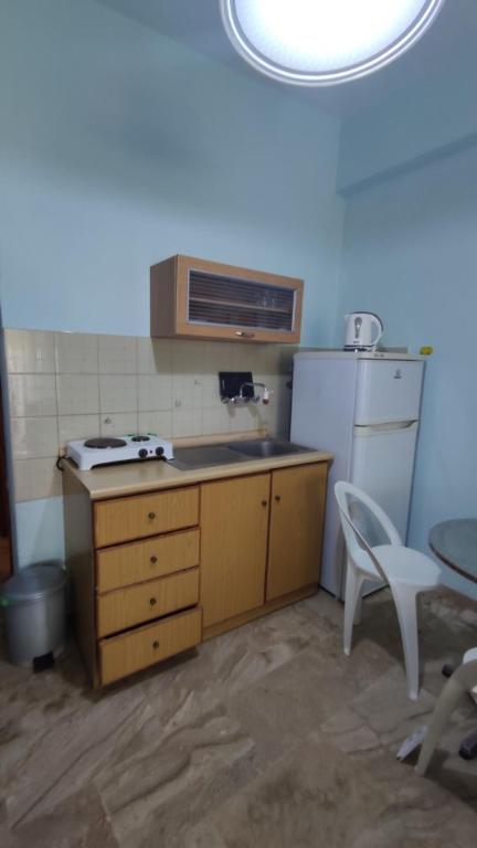 Kuchyň nebo kuchyňský kout v ubytování Ainalis Apartments