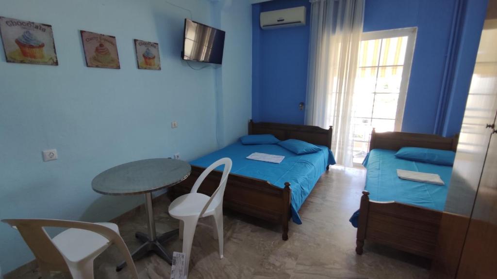 Postel nebo postele na pokoji v ubytování Ainalis Apartments