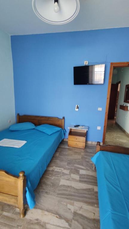 Postel nebo postele na pokoji v ubytování Ainalis Apartments