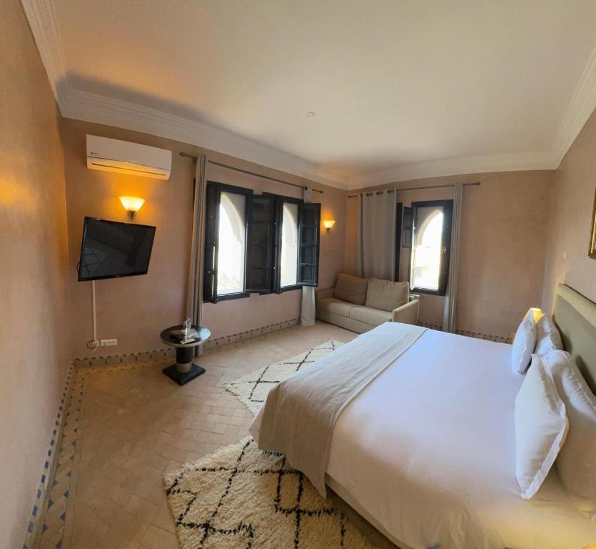Postel nebo postele na pokoji v ubytování Villa Thaifa