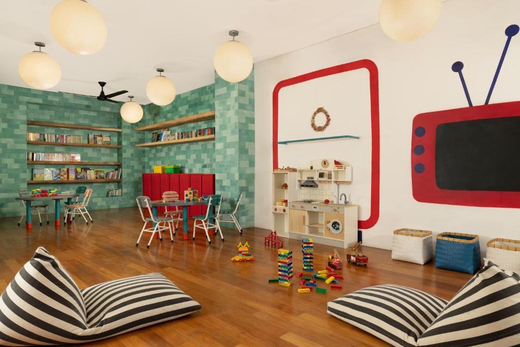 TV a/nebo společenská místnost v ubytování COMO Uma Canggu