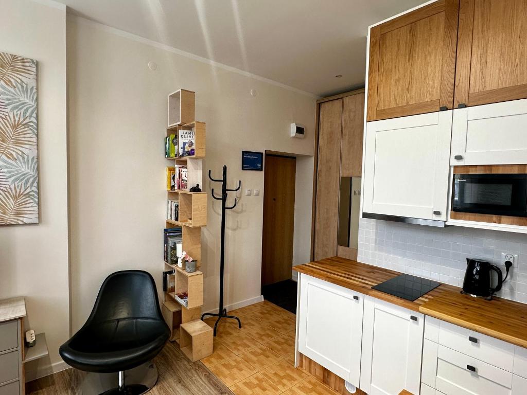 Kuchyňa alebo kuchynka v ubytovaní Like-a House Centrum