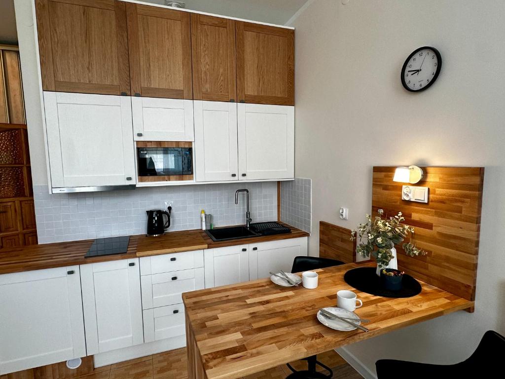 Kuchyňa alebo kuchynka v ubytovaní Like-a House Centrum