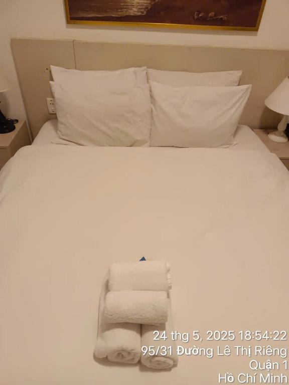 Postel nebo postele na pokoji v ubytování Starlight Hotel