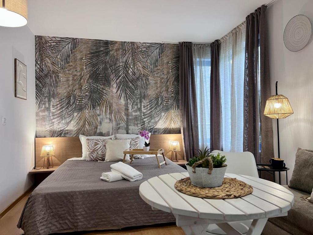 Ένα ή περισσότερα κρεβάτια σε δωμάτιο στο Apartment Excelsior Romantic 50m to the beach