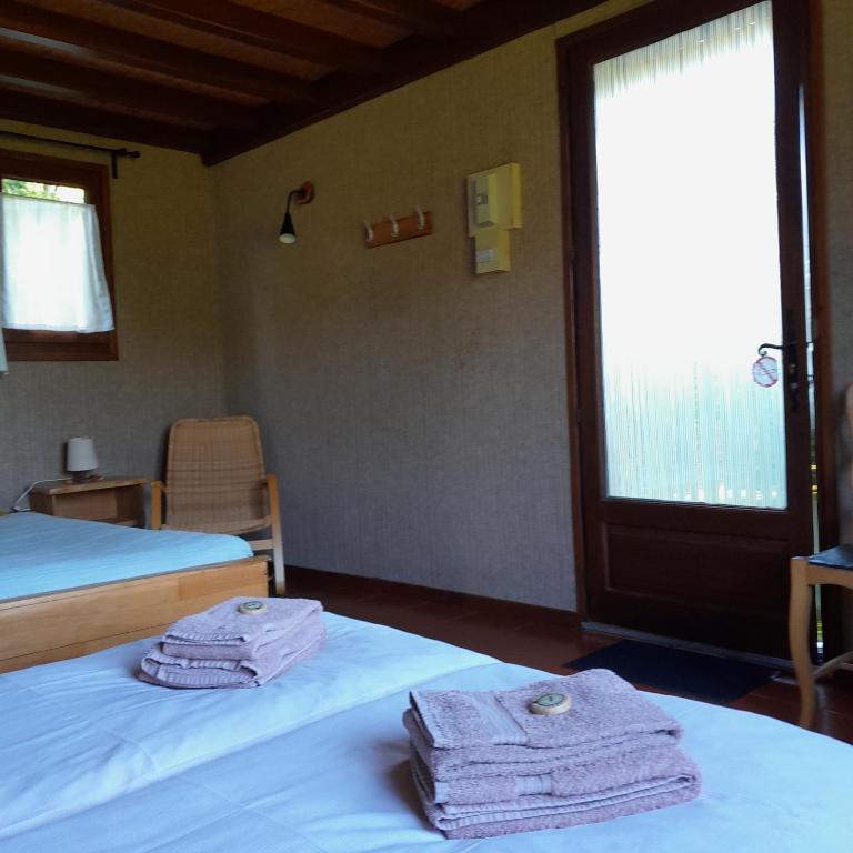 Postel nebo postele na pokoji v ubytování B&B Las Trinquades
