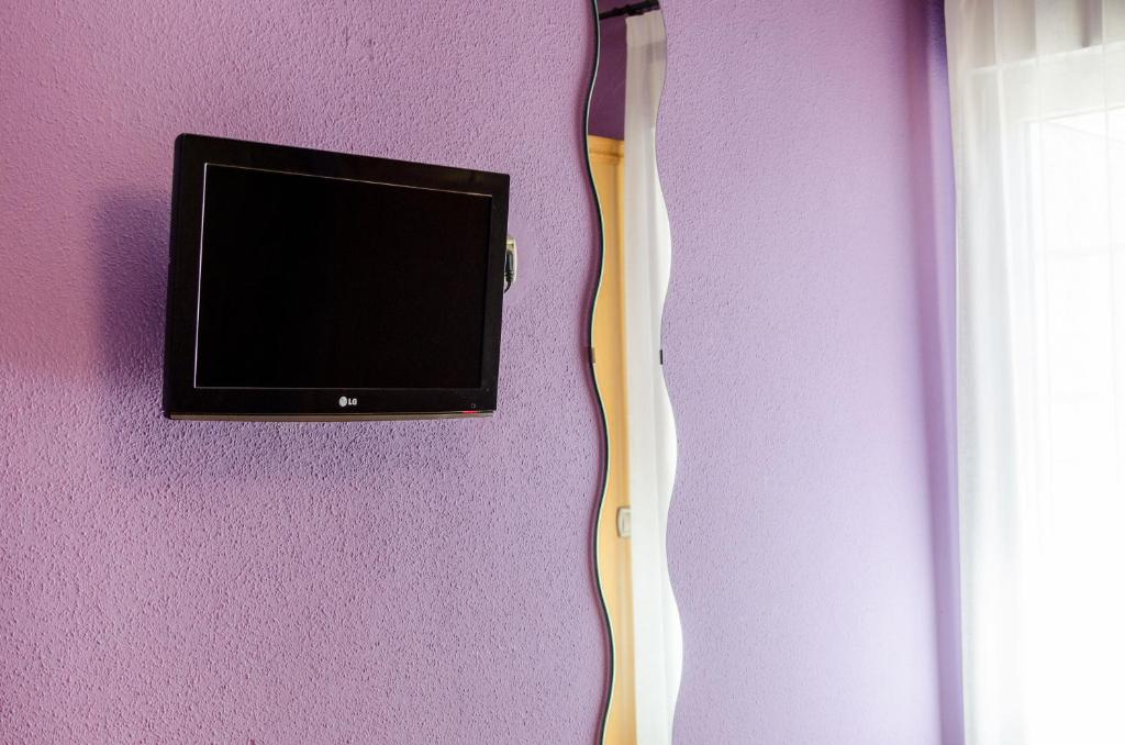 TV a/nebo společenská místnost v ubytování Las Abadías