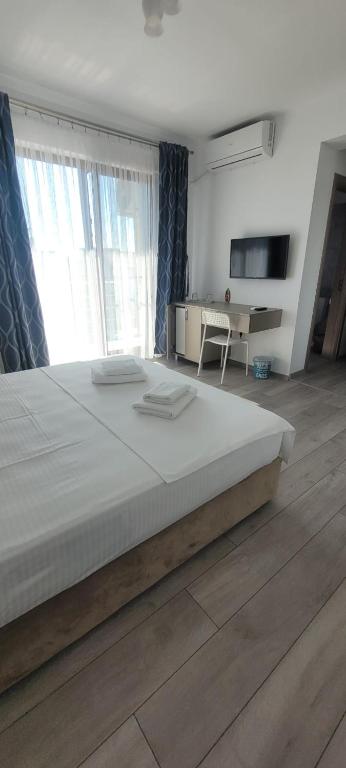 Postel nebo postele na pokoji v ubytování Vila Ame Eforie Nord