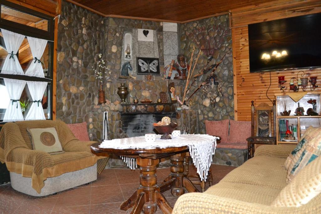 TV a/nebo společenská místnost v ubytování Safari