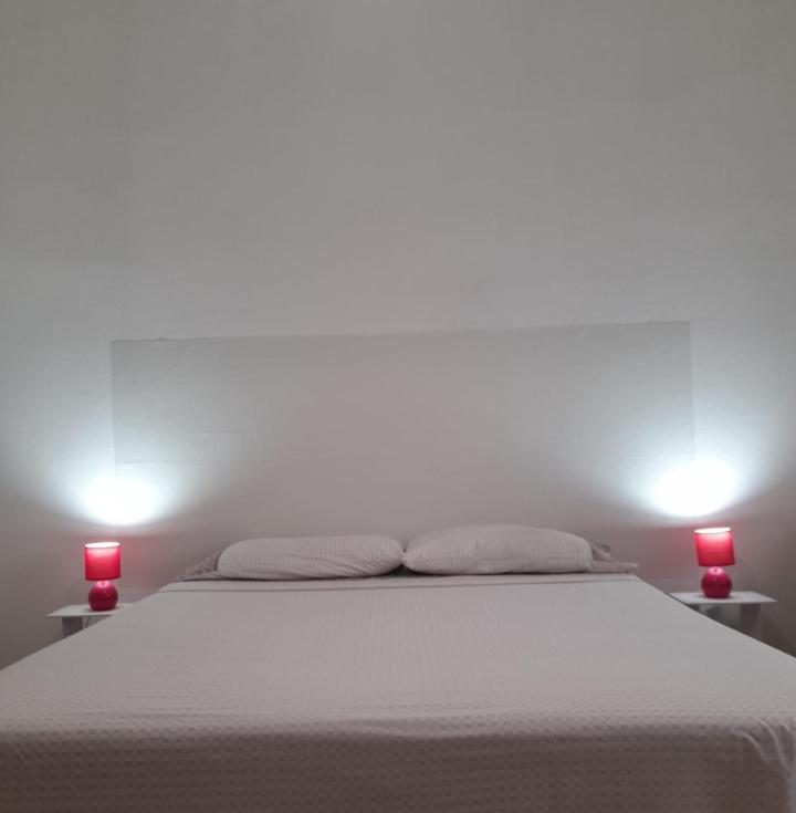 Postel nebo postele na pokoji v ubytování Via G 41