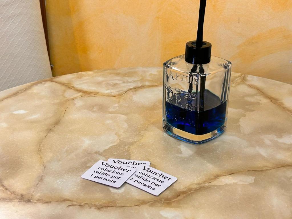 a vase sitting on top of a table at Locanda Dei Baroni in Vasto