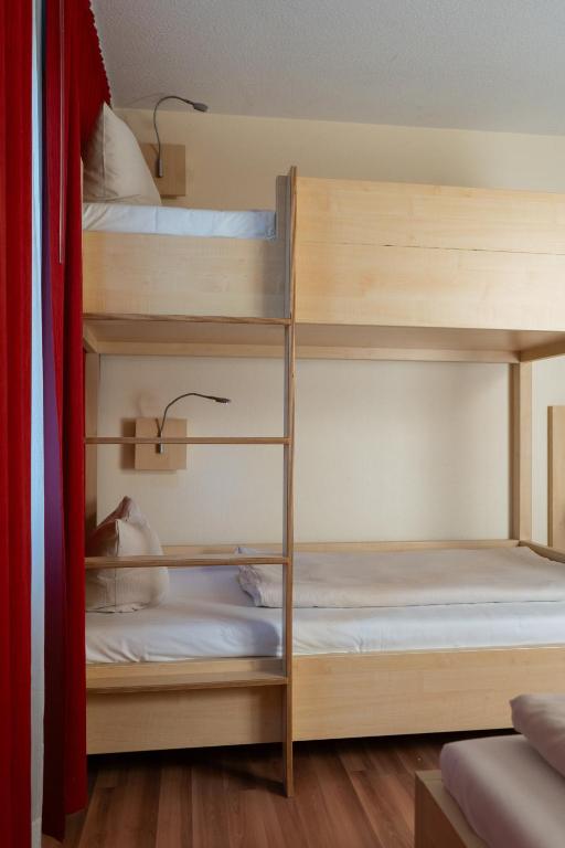 Postel nebo postele na pokoji v ubytování Autohof Hotel Salzbergen