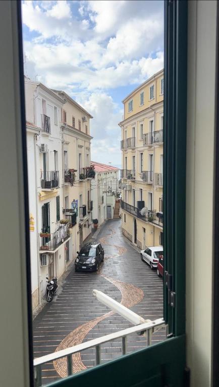 a view of a city street from a window at Dimora di Diamante in Diamante
