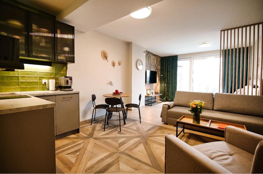 Η κουζίνα ή μικρή κουζίνα στο 4 people studio, lake, sauna & gym