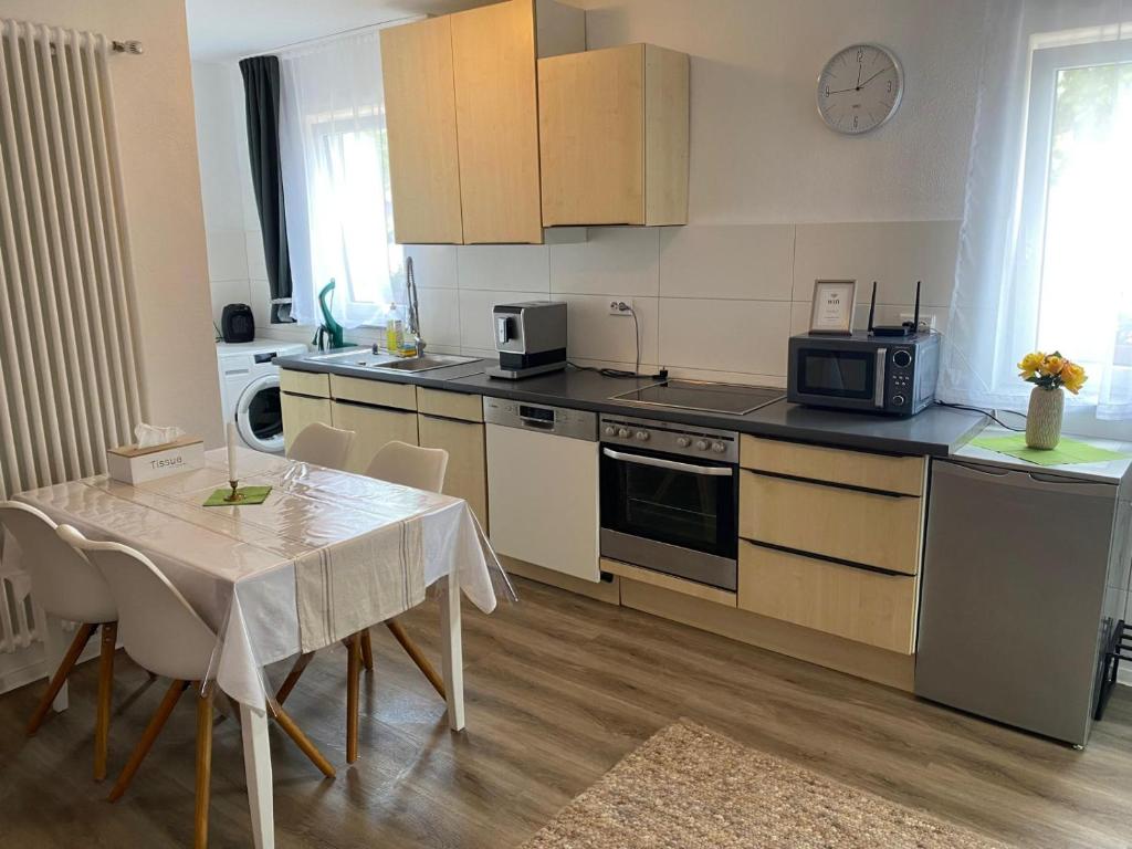Η κουζίνα ή μικρή κουζίνα στο Ferienwohnung Venningen