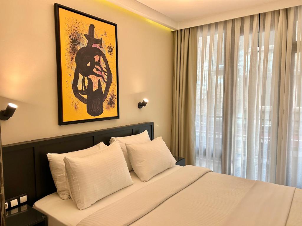 Postel nebo postele na pokoji v ubytování Fitas Oda Hotel