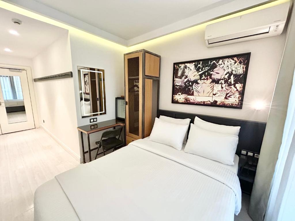 Postel nebo postele na pokoji v ubytování Fitas Oda Hotel