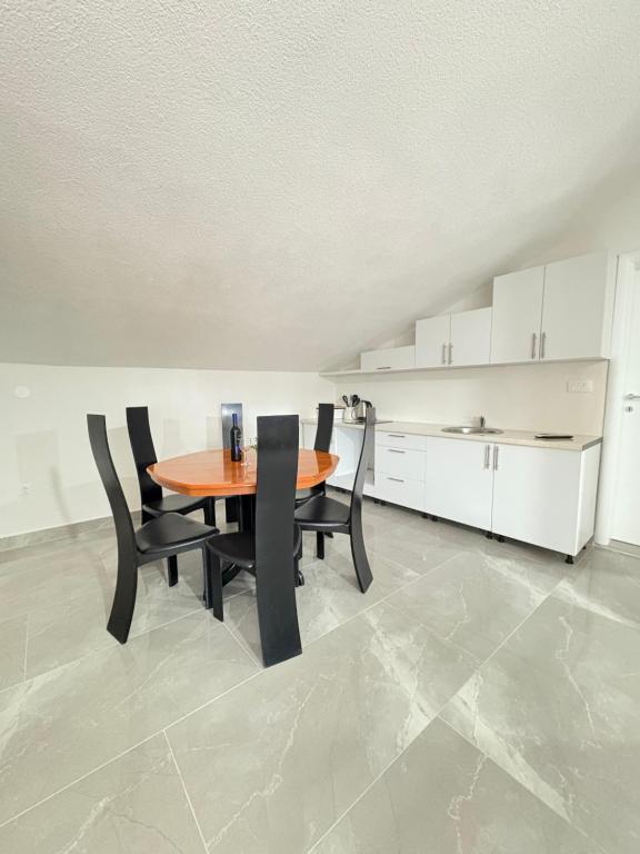 Kuchyň nebo kuchyňský kout v ubytování Apartmani Neum