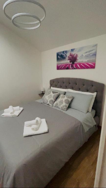 Postel nebo postele na pokoji v ubytování B&B La Fortezza