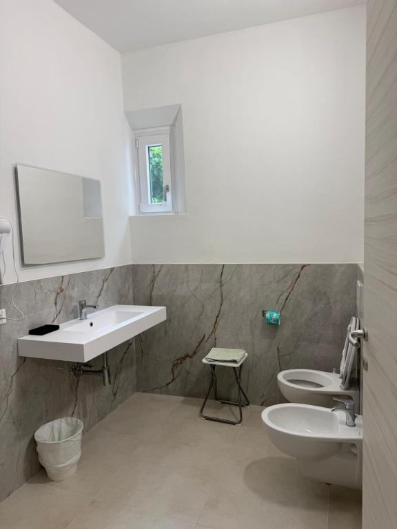 Koupelna v ubytování Hotel Pigalle