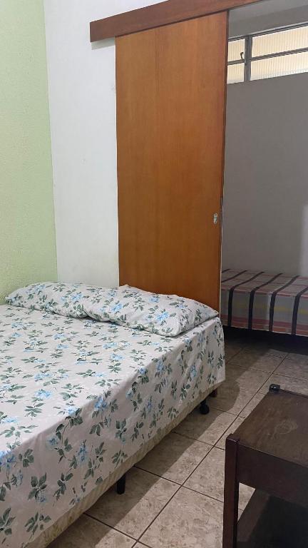 Postel nebo postele na pokoji v ubytování Pousada e Alojamento Engenho de Itaguaí