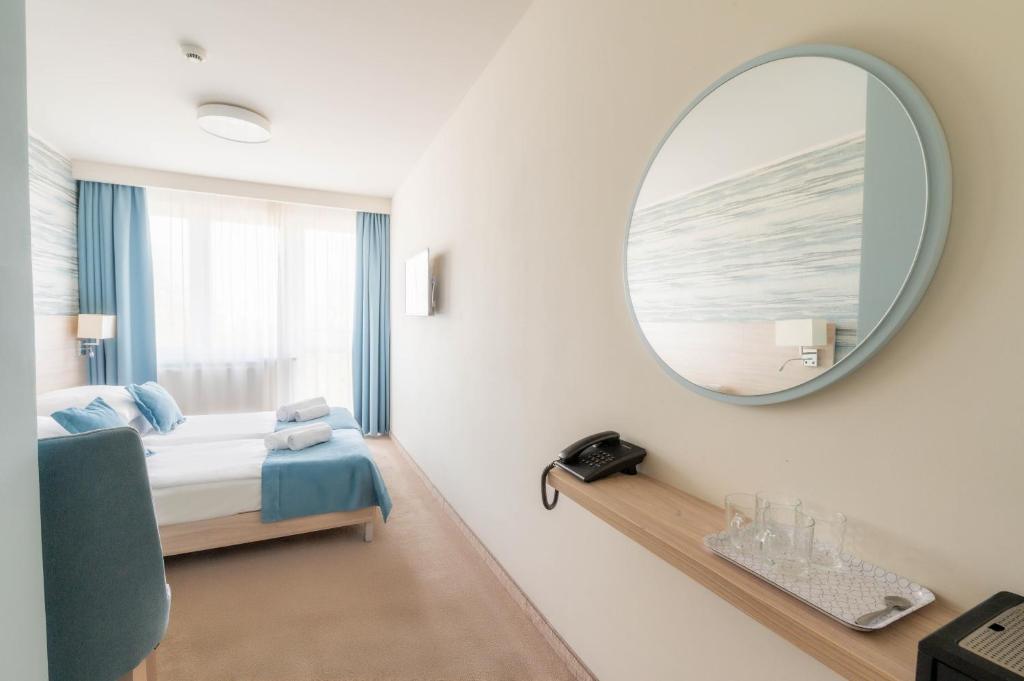 Postel nebo postele na pokoji v ubytování ALKA Sun Resort